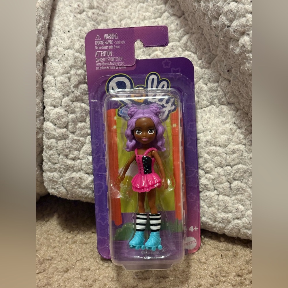 NWT Polly Pocket doll with roller skates and purple hair